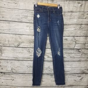 Hollister size 1R ripped, high rise, dark wash, super skinny jeans.Waist appr